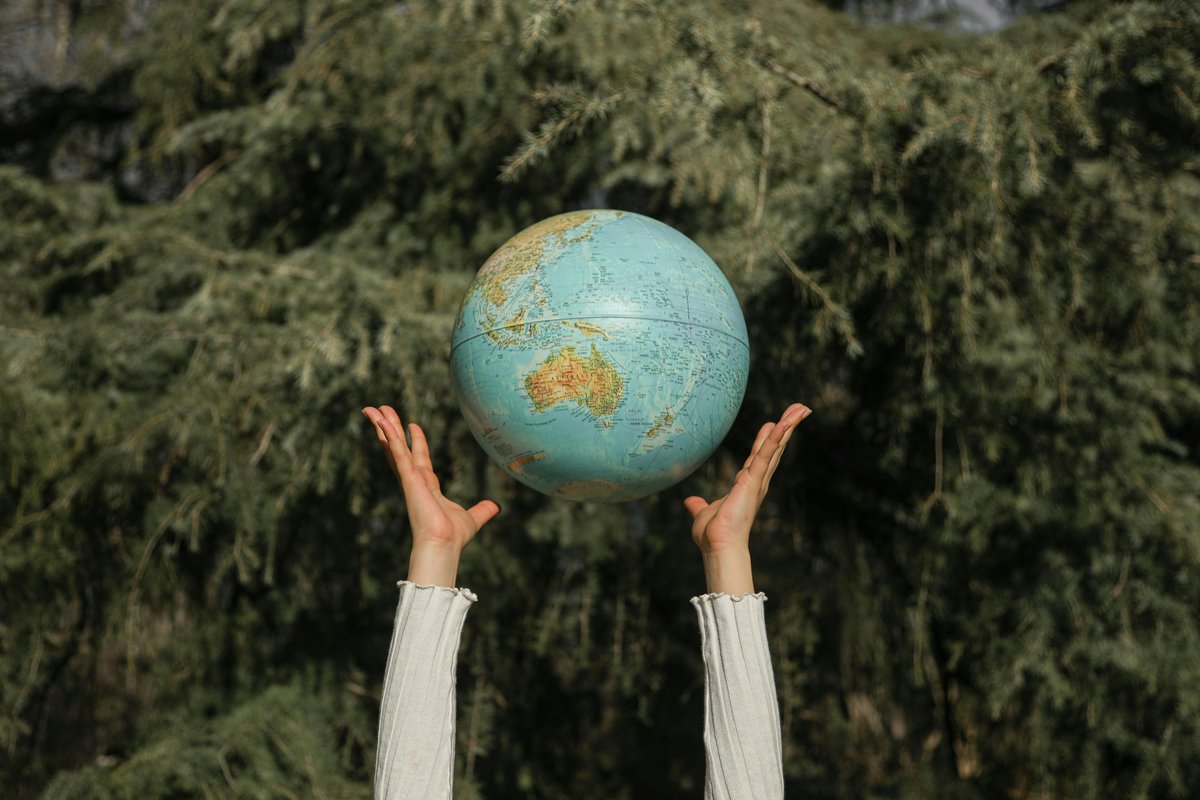 Globe held by hands