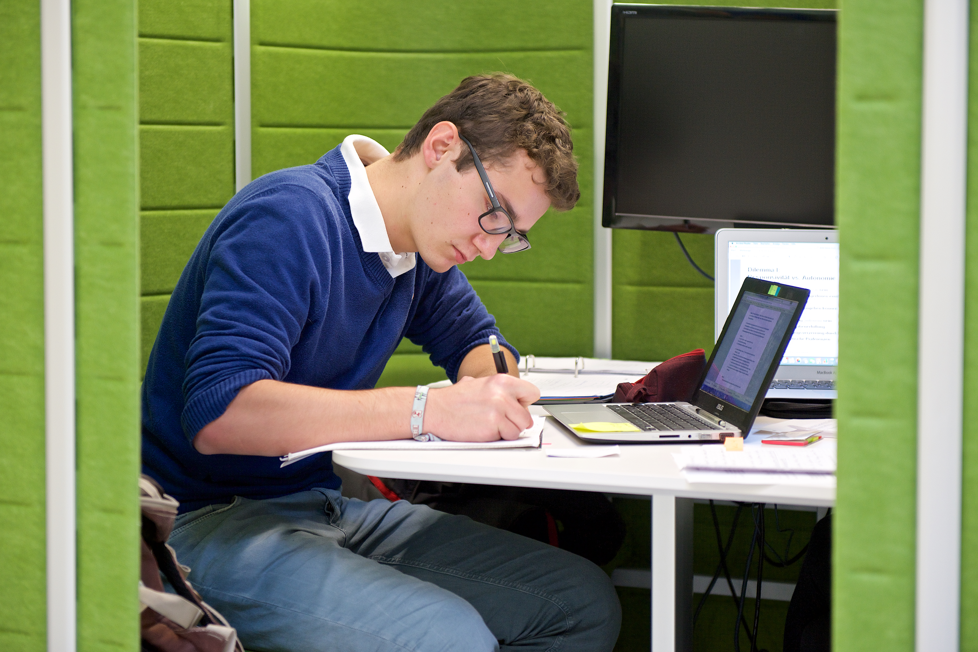 Student studies in the library